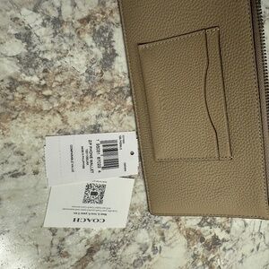 Coach zip phone wallet- new